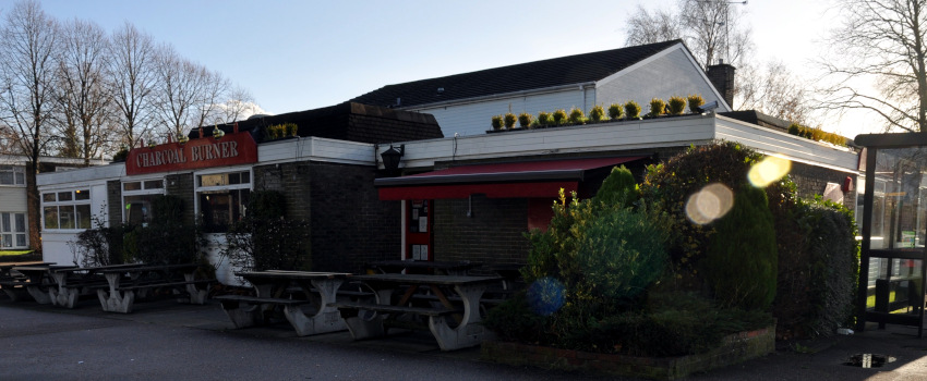 modern building with benches outside