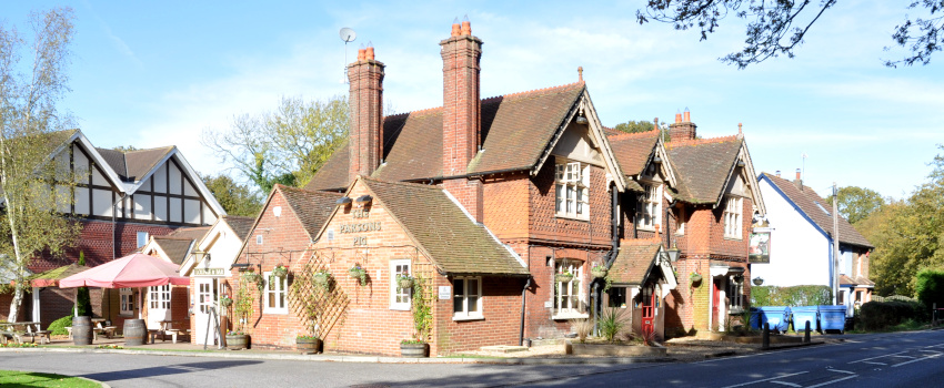 large brick building labelled Parsons Pig