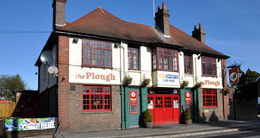 large building labelled The Plough