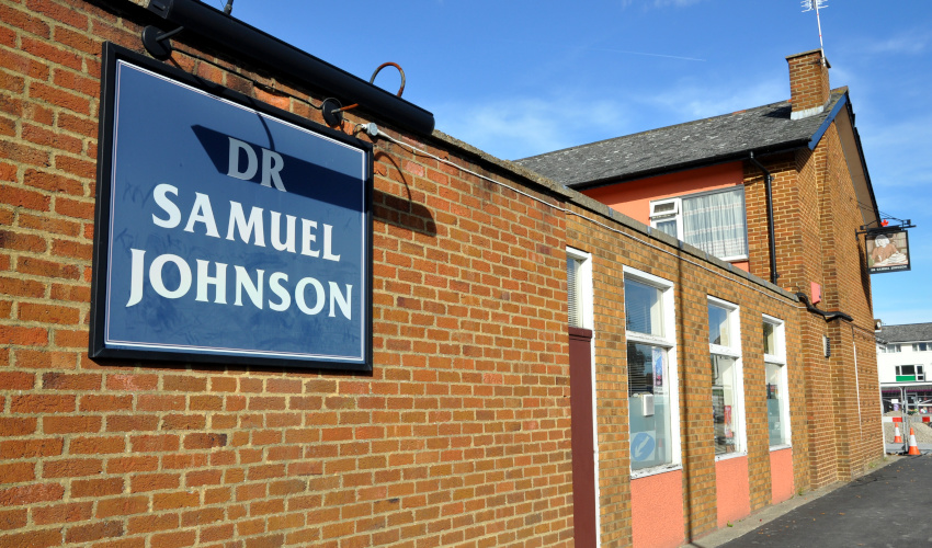 brick wall with sign labelled Dr Samuel Johnson