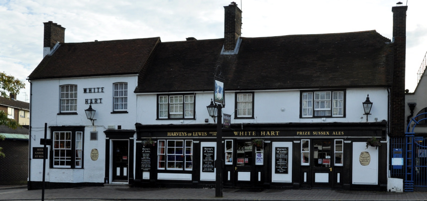 old white building labelled White Hart